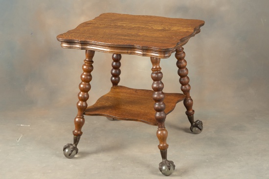 Antique quarter sawn oak Lamp Table with Tiffany Style ball and claw feet. Nice finish and condition