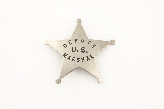 Silver colored vintage 5-point Ball Star Badge marked â€œDEPUTY U.S. MARSHALâ€, has working pin and