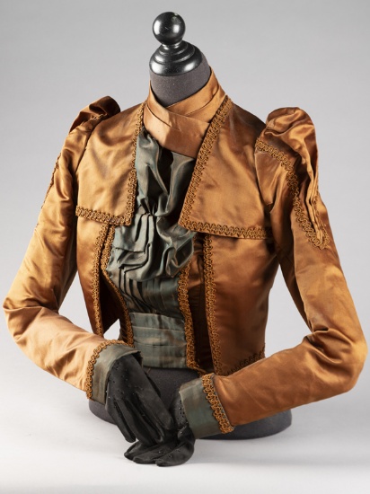 Unique Victorian Advertisement for Victorian Clothes on a half mannequin, complete with black gloves