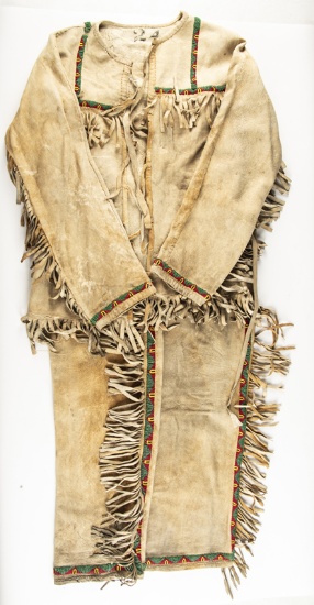 Vintage matching 2-piece Wild West fringed and beaded Jacket and Pants Set. The original stock numbe