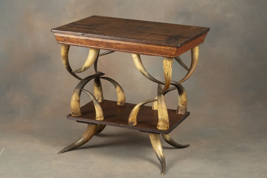 Vintage wooden and horn Table, early 1900s, with all matching 20 horn construction. Table measures 2