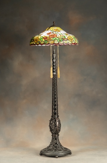 Beautiful antique bronze and leaded glass shade Floor Lamp, circa 1920s, with extremely ornate pierc