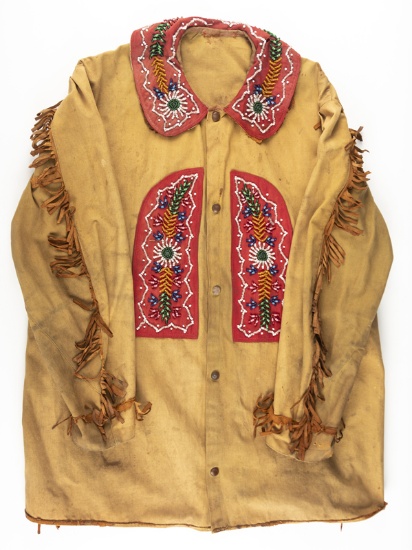 Antique, circa 1920-1925, canvas Wild West fringed and beaded Jacket. The type that was used in the