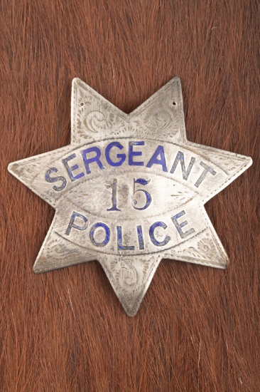 Vintage 7-point Star Badge marked â€œSERGEANT/ 15/ POLICEâ€, two holes at the top of badge, looks l