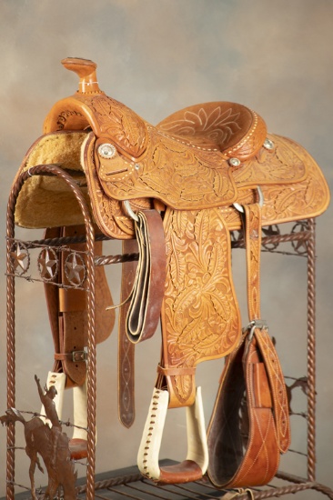 Extremely fine highly tooled Saddle marked "King, Waco, Tex." Saddle is in unused condition with 15"