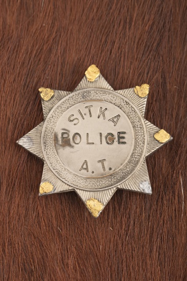 Small vintage 8-point Star Badge marked â€œSITKA POLICE A.T.â€, is a very unusual designed badge wi