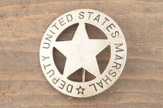 Silver colored vintage 5-point, cut-out Circle Star Badge marked â€œDEPUTY UNITED STATES MARSHALâ€.