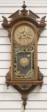 Antique walnut New Haven, American Calendar Wall Clock, circa 1886, eight day time and strike, in be