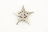 Silver colored vintage 5-point Ball Star Badge marked â€œDEPUTY U.S. MARSHALâ€, has working pin and
