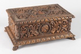 Extremely ornate walnut hand carved Jewelry Box with carved footed base, circa 1900, fully carved on