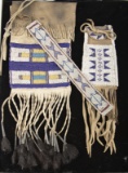 This lot consists of three items to include: (1) Beaded Flint Bag with fringe and tin tassels. (2) A