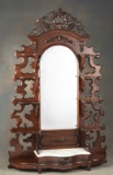 Antique Victorian walnut, early marble top Etagere with carved grapes and floral crest, circa 1880s.