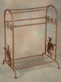 Fine custom iron Saddle Stand with silhouettes of cowboys on bucking horses on each end and a row of