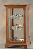 Unique oak and glass floor model Showcase, attributed to J.W. Winchester Co., with full length glass