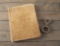 This lot consists of the following  two items to include: A hair on hide Book #130 titled 