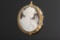 Ladies 18kt yellow gold .34mm cameo pin/pendant. Showing Replacement Value $850.00. The Late Joe & B