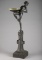 Heavy bronze figural Cigar Stand with green onyx removable ashtray that has small nick on outside ed