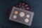 Group of five (5) uncirculated cased Proof Sets, dated 1984, totaling 25 Coins. Each case contains,