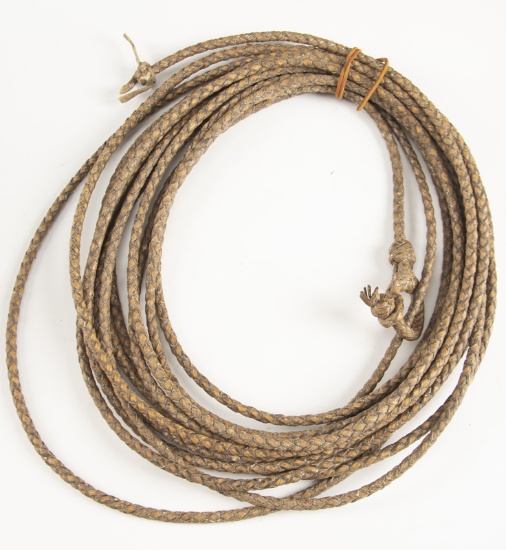 Exceptional braided rawhide Reata, approximately 40 ft. long, with unusual braided hondo. Nice overa