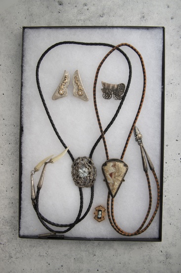The following five (5) Items were some of C.W.'s personal items. C.W. was a very sharp dresser. Thes