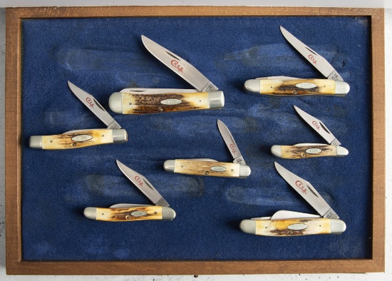Set of seven (7) Double X Case Collectors Folding Blade Pocket Knives with polished stag handles. Th