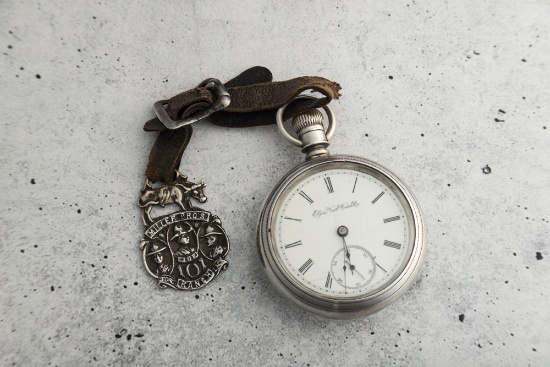 Antique open face silver man's Pocket Watch, manufactured by Elgin National Watch Co., in running co