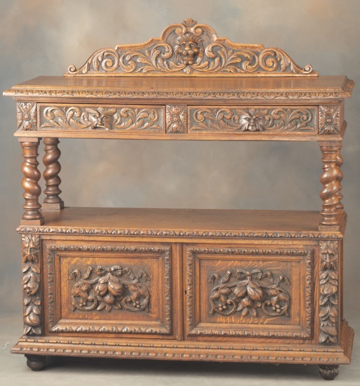 Beautiful antique quarter sawn oak Side Server, circa 1900, with fruit carved doors at base, lion he