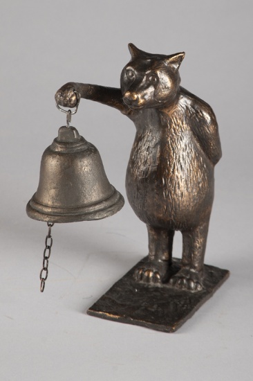 Small Bronze Bear with bell, measures 10 1/2" T x 6" L x 4" W and has 4" bell with clapper.