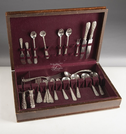 Partial set of Stieff Sterling Flatware in wooden box totaling 27 pieces. Some large serving pieces,