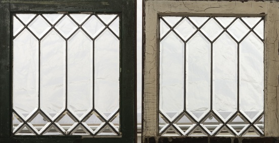 A pair of antique leaded and beveled glass Windows in very good condition, frames 21 1/2" lx 20 1/2"