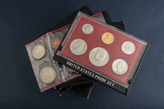 Group of seven (7) uncirculated cased U.S. Proof Sets, totaling 42 Coins. Five are dated 1980, two a