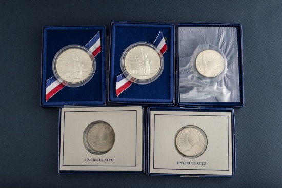 This lot has five (5) uncirculated U.S. Coins to include three (3) Uncirculated Commemorative 1986-1