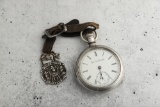 Antique open face silver man's Pocket Watch, manufactured by Elgin National Watch Co., in running co