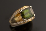 Ladies custom 18kt yellow gold ring containing 1.40ctw round brilliant cut diamonds possessing G col