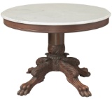 Extremely fine antique carved mahogany Center Table with ornate carved claw foot pedestal that suppo