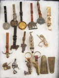 Framed Collection of 17 Items to include 10 Advertising Watch Fobs, 3 Watch Chains with fobs, 2 Pist