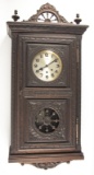 Antique German Wall Clock, eight day time and strike, in heavily carved oak case marked 