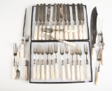 Group of fancy mismatched Silverware totaling 33 pieces with mother of pearl handles. The Late C.W.