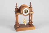 Antique French Swing Clock with gold girl on swing pendulum. Case is walnut, porcelain dial, both ti