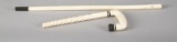 Carved 2 piece Cane, possibly bone with carved twisted shaft. When cane is put together it measures