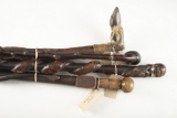 Group of four (4) vintage folk art wooden Canes. (1) A 37