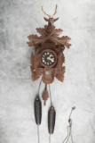 German two-weight Cuckoo Clock with stag head crest. Clock measures 16