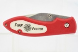(12) New-In-Box Fire Fighter Folding Knives - W/ Sheaths