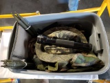Tub of camo clothing, tent poles, mag lite, misc