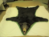 Large black bear rug