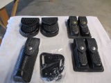2 handcuff holsters, 2 magazine holsters, baton
