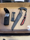 Gerber knife, bone saw w/sharpener, Gerber knife