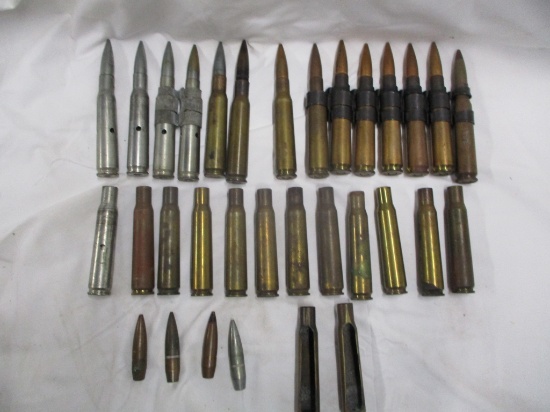 9 Rds. 50 cal BMG,  4 dummy rds, 3 bullets plus