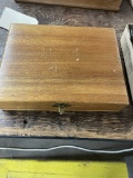 Assorted pocketknives in wooden box