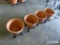 4 SMALL FLOWER POTS ON STAND